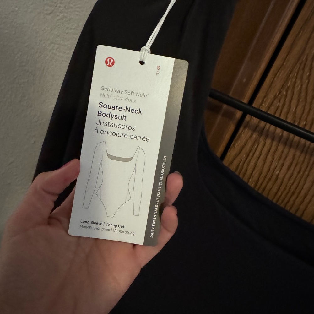 Size small Lululemon long sleeve body suit new with tags